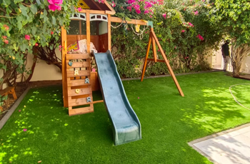 artificial-grass-playground-slides