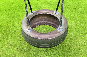 artificial-grass-tyre-swing
